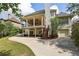 Home has a large backyard, covered deck and three-car garage at 2922 Heart Pine Way, Buford, GA 30519