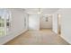 Bedroom features a ceiling fan, plantation shutters, and neutral carpet at 2922 Heart Pine Way, Buford, GA 30519