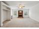 Bright bedroom boasts a brick fireplace, built-in shelves, and large windows at 2922 Heart Pine Way, Buford, GA 30519