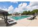 Relaxing community pool area with lounge chairs and a gazebo at 2922 Heart Pine Way, Buford, GA 30519