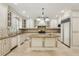 Gourmet kitchen with custom cabinets, granite countertops, and a central island at 2922 Heart Pine Way, Buford, GA 30519