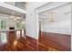 Spacious living room with fireplace, hardwood floors, and elegant architectural details at 2922 Heart Pine Way, Buford, GA 30519