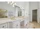 Well-lit bathroom with double sinks and ample counter space at 2922 Heart Pine Way, Buford, GA 30519