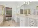 Main bathroom includes double sinks, and a glass shower at 2922 Heart Pine Way, Buford, GA 30519