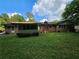 Brick ranch home boasts spacious backyard with lots of room for activities at 417 Ohern Ct, Stone Mountain, GA 30088