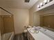 Bathroom with large mirror, vanity and tiled shower at 417 Ohern Ct, Stone Mountain, GA 30088