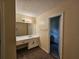 Bright bathroom with a single sink vanity and ample counter space at 417 Ohern Ct, Stone Mountain, GA 30088