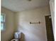 Small bathroom with standing shower and toilet at 417 Ohern Ct, Stone Mountain, GA 30088