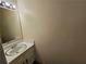 This bathroom features a white vanity with a sink and modern lighting at 417 Ohern Ct, Stone Mountain, GA 30088