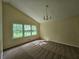 Bedroom with many windows to view the surrounding landscape at 417 Ohern Ct, Stone Mountain, GA 30088