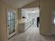 Efficient kitchen with white cabinets, tile floors, and stainless steel appliances for modern living at 417 Ohern Ct, Stone Mountain, GA 30088