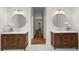 Elegant bathroom features dual vanities with modern fixtures, stylish mirrors, and marble countertops for a spa-like experience at 4294 Silver Peak Pkwy, Suwanee, GA 30024