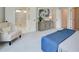 Serene main bedroom with a seating area, dresser and en-suite bathroom with a glass shower at 4514 Eastbrook Pl, Snellville, GA 30039