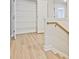 Hallway with linen closet and view to other rooms at 4651 Larkfield Way, Powder Springs, GA 30127