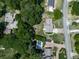 Aerial view showcases the property's layout with its pool, landscaping, and surrounding neighborhood at 760 Oakdale Rd, Canton, GA 30114