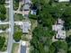 This aerial view highlights the property's setting, lush greenery, and neighborhood layout at 760 Oakdale Rd, Canton, GA 30114