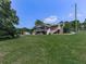 The house has a screened porch and a staircase to the yard at 760 Oakdale Rd, Canton, GA 30114
