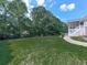 Expansive backyard featuring a well-maintained lawn, ideal for outdoor activities at 760 Oakdale Rd, Canton, GA 30114