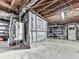 Spacious basement with exposed utilities, concrete floor, and shelving for storage at 760 Oakdale Rd, Canton, GA 30114