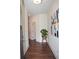 Welcoming entryway featuring hardwood floors, crisp white walls, and tasteful decor at 7624 Squire Ct, Fairburn, GA 30213