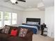Spacious main bedroom with a sitting area at 7624 Squire Ct, Fairburn, GA 30213