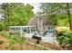 An outdoor oasis featuring a spacious deck, pergola, comfortable seating, perfect for relaxing and entertaining at 95 Loudoun Dr, Covington, GA 30014