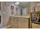 Bright bathroom featuring double sink vanity and neutral decor at 95 Loudoun Dr, Covington, GA 30014