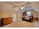 Bedroom with carpeted floors, painted walls, ceiling fan and overhead lighting at 95 Loudoun Dr, Covington, GA 30014