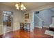Intimate dining area with a modern table, providing seamless access to the kitchen and other living areas at 95 Loudoun Dr, Covington, GA 30014