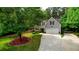 Charming two-story home with a well-manicured lawn and attached two car garage at 95 Loudoun Dr, Covington, GA 30014