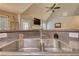Kitchen sink featuring granite countertops and views of the living room fireplace at 95 Loudoun Dr, Covington, GA 30014