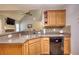 Eat-in kitchen sink featuring granite countertops, stainless appliances, and modern tile backsplash at 95 Loudoun Dr, Covington, GA 30014