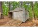 Shot of a utility building in a wooded area with a ramp and loading area at 95 Loudoun Dr, Covington, GA 30014