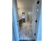 Stylish bathroom with marble-look tile flooring and a vanity with storage at 129 Silvercrest Dr, Acworth, GA 30101