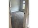 Cozy bedroom with plush gray carpet and natural light from the window at 129 Silvercrest Dr, Acworth, GA 30101