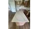 Kitchen island with white quartz countertop and wood floor at 129 Silvercrest Dr, Acworth, GA 30101