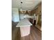 Bright kitchen featuring stainless steel appliances, light wood cabinets, and quartz countertops at 129 Silvercrest Dr, Acworth, GA 30101