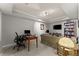 Finished basement space used as an office and seating area at 2084 Democracy Dr, Buford, GA 30519