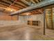 Unfinished basement with exposed duct work, concrete walls, and a concrete floor at 3957 Woodland Cir, Conyers, GA 30013