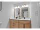 Bathroom with double vanity, quartz countertop, and modern fixtures at 4206 Lake Laurel Se Dr, Smyrna, GA 30082