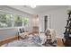 Relaxing bedroom space with natural light and comfortable seating at 4206 Lake Laurel Se Dr, Smyrna, GA 30082