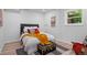 Inviting bedroom with neutral walls, stylish bedding, and ample natural light at 4206 Lake Laurel Se Dr, Smyrna, GA 30082