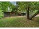 Charming home with mature trees and beautifully landscaped front yard and stone accents at 4206 Lake Laurel Se Dr, Smyrna, GA 30082