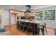 Spacious kitchen with stainless steel appliances, island, light cabinetry, and hardwood floors at 4206 Lake Laurel Se Dr, Smyrna, GA 30082