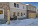 Townhouse backyard with patio area and partial fencing at 4671 Larkfield Way, Powder Springs, GA 30127