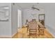 Bright dining area with modern table, chairs, and a view to the kitchen at 2638 Vinings Central Se Dr # 4, Atlanta, GA 30339