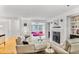 Bright living room features a fireplace, hardwood floors, and white walls at 2638 Vinings Central Se Dr # 4, Atlanta, GA 30339
