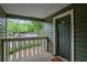 A view of the porch, with the door marked 2638, and an open view at 2638 Vinings Central Se Dr # 4, Atlanta, GA 30339