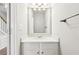 This bathroom has a vanity, a large mirror, a shower, and a nearby doorway at 3880 Lake Lanier Dr, Duluth, GA 30097