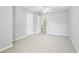 Spacious bedroom with neutral walls, carpet, and ensuite bathroom at 3880 Lake Lanier Dr, Duluth, GA 30097